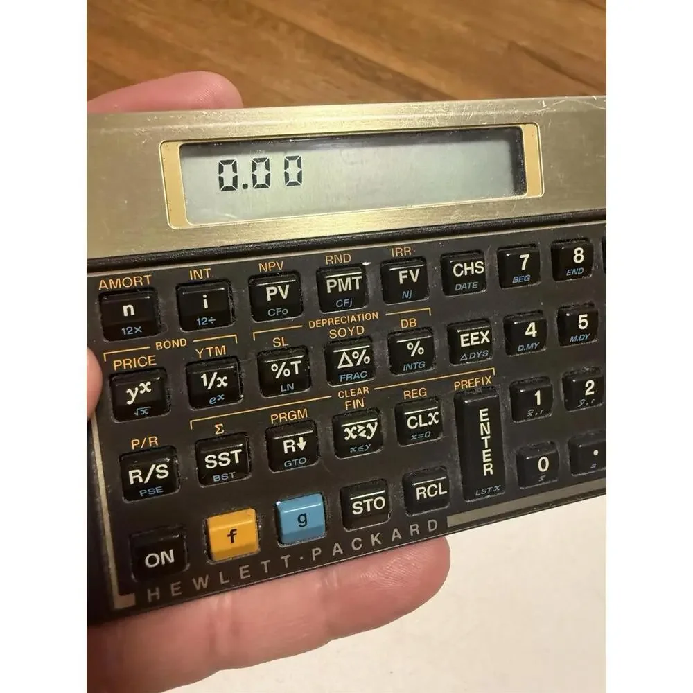 Hewlett Packard HP 12C Financial Calculator With Original Case
